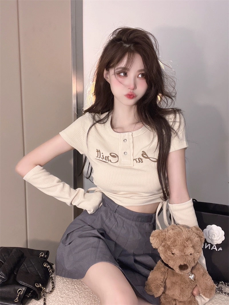 ギャル正肩ニット半袖Tシャツ女性夏2023新作ショートタイプ小さいサイズの紐を引いておへそを出してセクシーな上着番号ZT423
