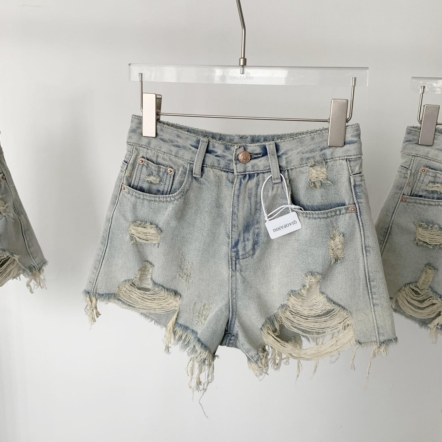 甘辛風ショートタイプトップス女韓系半袖スリム正肩ひもchic純欲猫Tシャツ穴あきデニムショートパンツ女性春新作セクシーギャルゆったり痩せワイド脚A字ホットパンツ番号ZT17